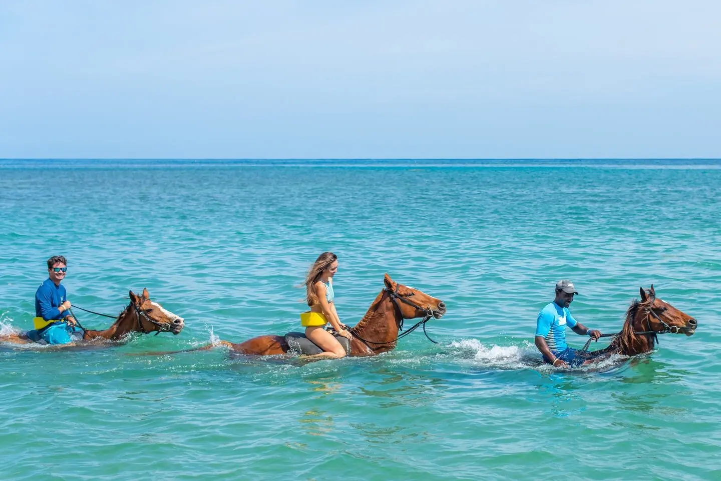 Horseback riding in the sea